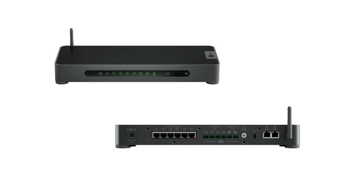 Two views of a black network appliance: front with green LEDs and a single antenna, and rear with multiple ports and another antenna for rugged enterprise use.